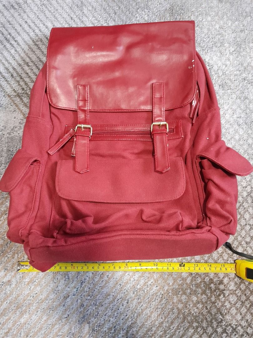 Zero Gravity Red Mono Rucksack / Men's Bag / Men's Backpack (Category: Backpacks) located in Kawit. Submitted by namhyunje (Listing ID 1331964633, Image 1). Description: Zero Gravity Red Mono Rucksack / Men's Bag / Men's Backpack Rucksack made from red canvas textile and red synthetic leather. Main inner compartment with zipper closure, inside pocket and laptop sleeve pocket, double magnetic strap closure, adjustable leather shoulder straps with 