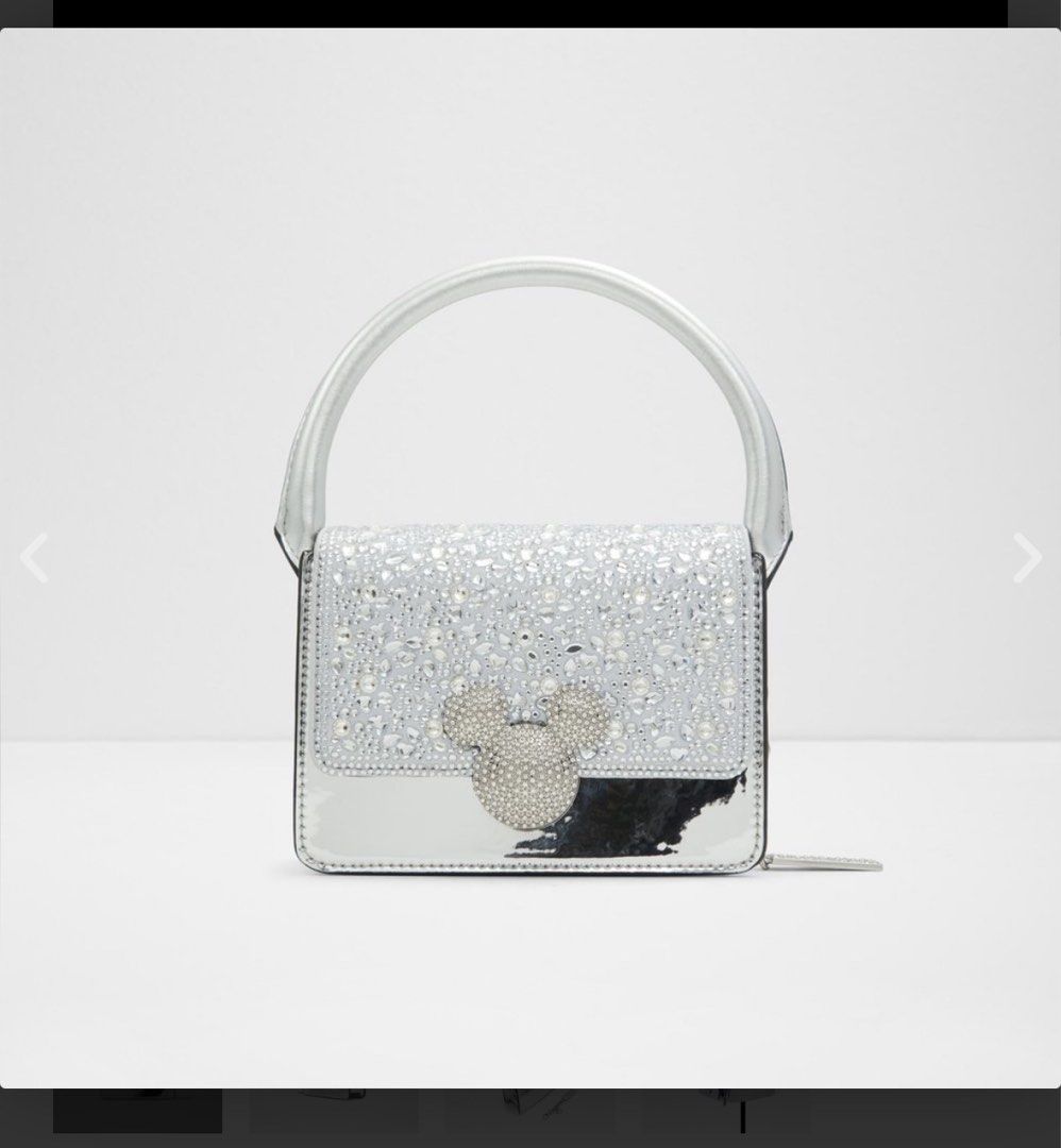 Aldo Crossbody Bag (Category: Cross-body Bags) located in Mandaluyong City. Submitted by mayanimosity (Listing ID 1332122447, Image 2). Description: Disney x ALDO Top handle Adjustable crossbody strap Rhinestone ornamentation Magnetic snap closure Materials Upper: Synthetic Measurements 19 x 8 x 23 CM fits an iphone 15 and a small flat purse Price: 2000 LAST PRICE POSTED RFS: decluterring White elephant.