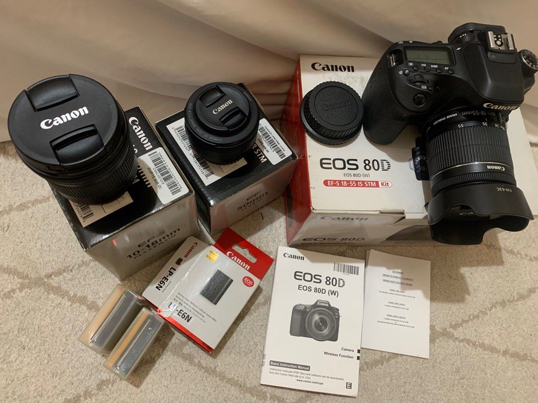 Canon 80D DSLR Camera Set (Category: Cameras) located in Quezon City. Submitted by StylePoise (Listing ID 1332149540, Image 2). Description: CANON EOS 80D FULL CAMERA SET (with box) - (1) Canon 80D Body, (2) batteries, (1) 50mm lens, (1) 10-18mm lens, (1) Kit Lens 18-55mm with hood, screen protector and battery charger. (No SD Card Included) Breakdown (Retail Price - amount bought): EF 50mm - ₱8,498.00 EFS 10-18mm - ₱15,998 Canon 80d with Kit Len
