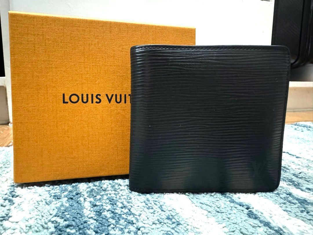 Louis Vuitton Authentic bifold wallet (Category: Luxury Bags & Wallets) located in Marikina City. Submitted by shasundaeclothings (Listing ID 1325745118, Image 1). Description: Authentic With box Personally bought in Japan Very clean See minimal sign of repair at coin slot (professionally repair by doc leather) .