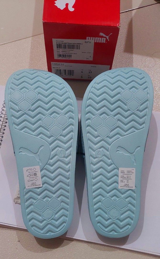 ORIGINAL PUMA SLIDES (Category: Slippers and slides) located in Quezon City. Submitted by letsdecluttermanila (Listing ID 1332256665, Image 3). Description: used once lang in the mall mukhang bago pa din..no box na po kasi may shoe box naman kami sa house comfy sa paa but a bit big lang for me kaya sell o nalang.