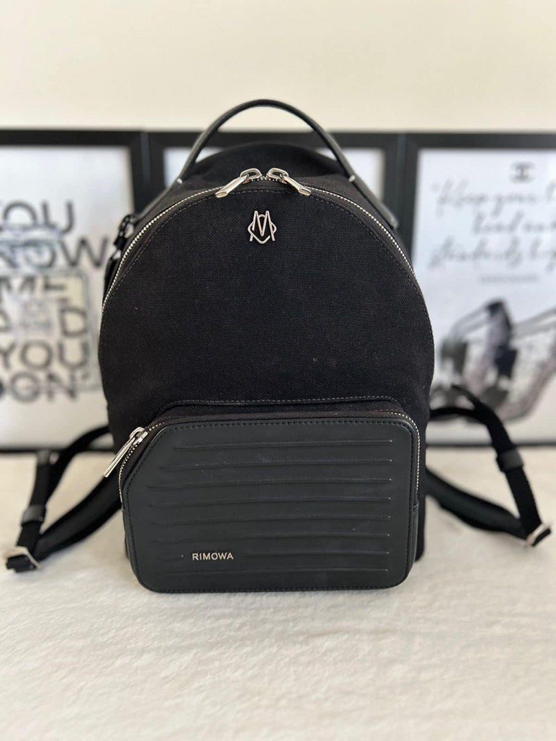 Rimowa Never Still Small Backpack (Category: Luxury Bags & Wallets) located in Manila. Submitted by bagislifeshop (Listing ID 1332266066, Image 1). Description: ☑️Available in Pampanga ✅Condition: 8.8/10 ✅Colour: Black ✅Material: Exterior : Canvas, full grain leather ✅Inclusion: Replacement dustbag .