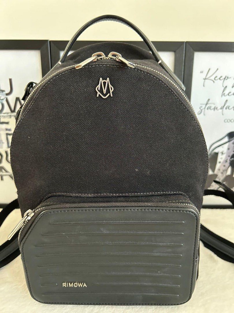 Rimowa Never Still Small Backpack (Category: Luxury Bags & Wallets) located in Manila. Submitted by bagislifeshop (Listing ID 1332266066, Image 2). Description: ☑️Available in Pampanga ✅Condition: 8.8/10 ✅Colour: Black ✅Material: Exterior : Canvas, full grain leather ✅Inclusion: Replacement dustbag .
