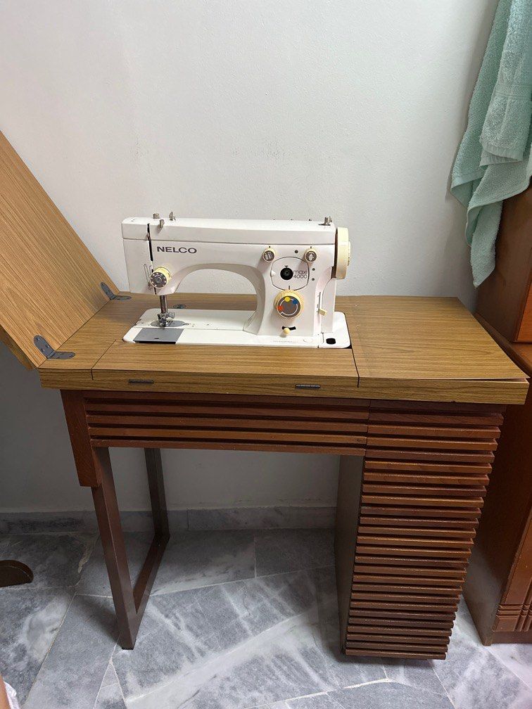 Sewing machine with hidden storage table top, TV & Home Appliances ...