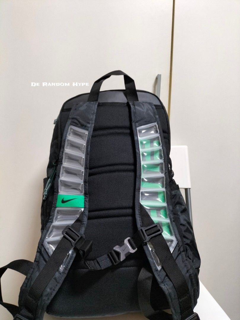 black and green nike backpack