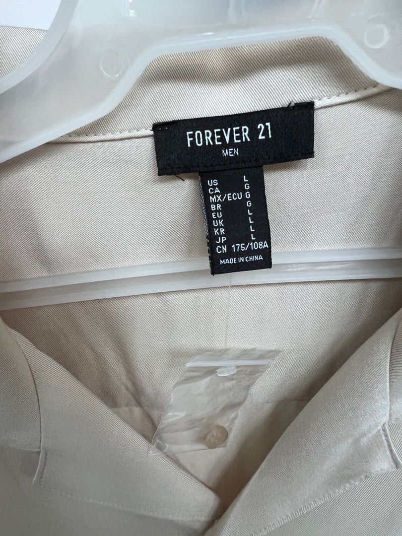 Forever 21 Mens Polo (Category: Tshirts & Polo Shirts ) located in Taguig. Submitted by ManMen (Listing ID 1332284403, Image 2). Description: Brand New - Large Color: beige Gcash .