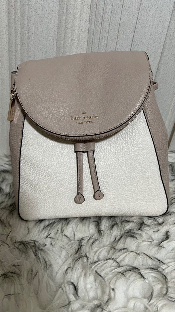 Pre-loved Kate Spade LEILA Medium Flap Backpack - Excellent Condition (Category: Backpacks) located in Cavite. Submitted by everythingnicehere (Listing ID 1332281781, Image 1). Description: ✅Genuine original 💯 from Canada ✅ Excellent condition; well maintained; no flaws ✅ On hand 🇵🇭; ready to ship ✅ Reason for selling: Decluttering; rarely used Color: warm beige/ white multi Pebbled soft leather Gold tone hardware no Two way spade jacquard lin