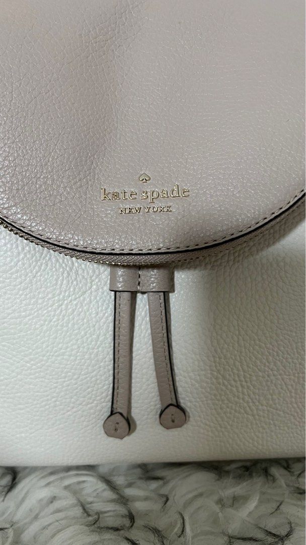 Pre-loved Kate Spade LEILA Medium Flap Backpack - Excellent Condition (Category: Backpacks) located in Cavite. Submitted by everythingnicehere (Listing ID 1332281781, Image 2). Description: ✅Genuine original 💯 from Canada ✅ Excellent condition; well maintained; no flaws ✅ On hand 🇵🇭; ready to ship ✅ Reason for selling: Decluttering; rarely used Color: warm beige/ white multi Pebbled soft leather Gold tone hardware no Two way spade jacquard lin