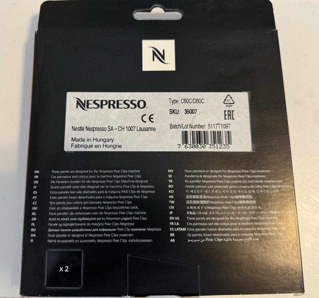 NESPRESSO Pixie Clips (Category: Coffee Machines & Makers) located in Singapore. Submitted by mickeysim79 (Listing ID 1332301416, Image 2). Description: One Plate Black with wordings and another in yellow In original packaging .