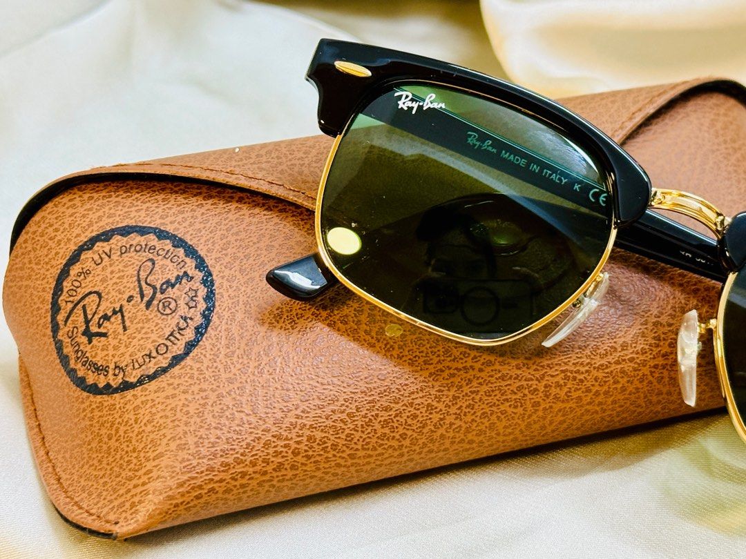 RayBan Clubmaster 49MM (Category: Sunglasses & Eyewear) located in Manila. Submitted by ___nluxuries (Listing ID 1332437301, Image 2). Description: Ray-Ban Clubmaster 49MM Very good condition Guaranteed original Nosepad changed w/ generics (no available original nosepads in any store I went to) No scratches on both lens Includes cleaning cloth and case The snap button leather is broken, however the snap close feature still works .