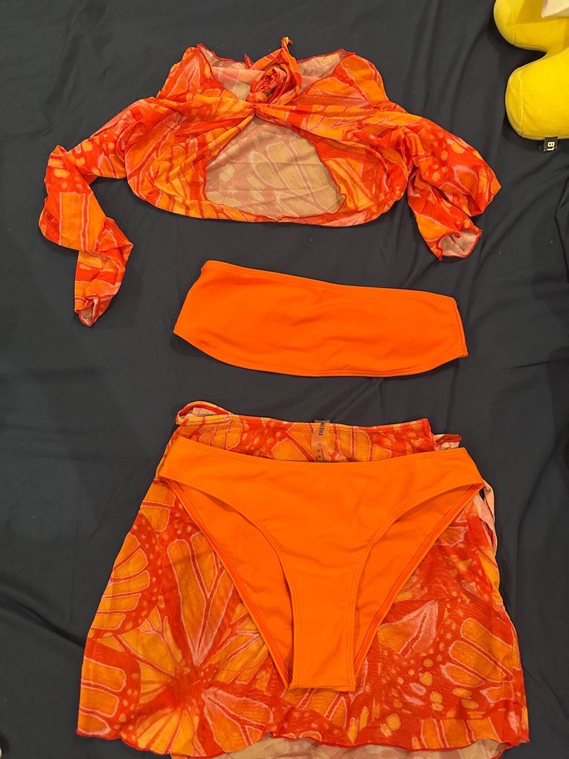 Shein 4 in 1 two-piece swimsuit (Category: Bikinis & Swimsuits) located in Quezon City. Submitted by raefinds (Listing ID 1332364198, Image 1). Description: With cover up (top & bottom) Brand new.