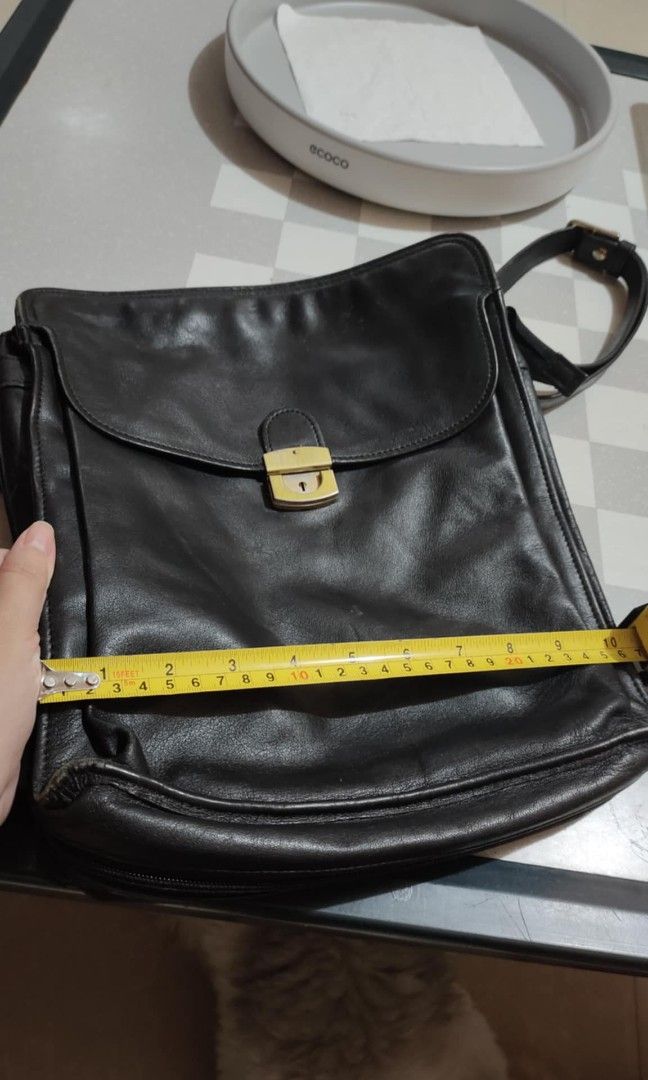 Vintage Genuine Leather Bag (Category: Luxury Bags & Wallets) located in Bulacan. Submitted by ourdailyfinds (Listing ID 1329333990, Image 2). Description: FOR SALE: Genuine Vintage Leather Messenger Bag from Japan This stylish and practical vintage leather bag is the perfect blend of functionality and timeless design. Features: High-quality leather with a unique patina that adds character Convenient front pocket for easy access with key Secure i
