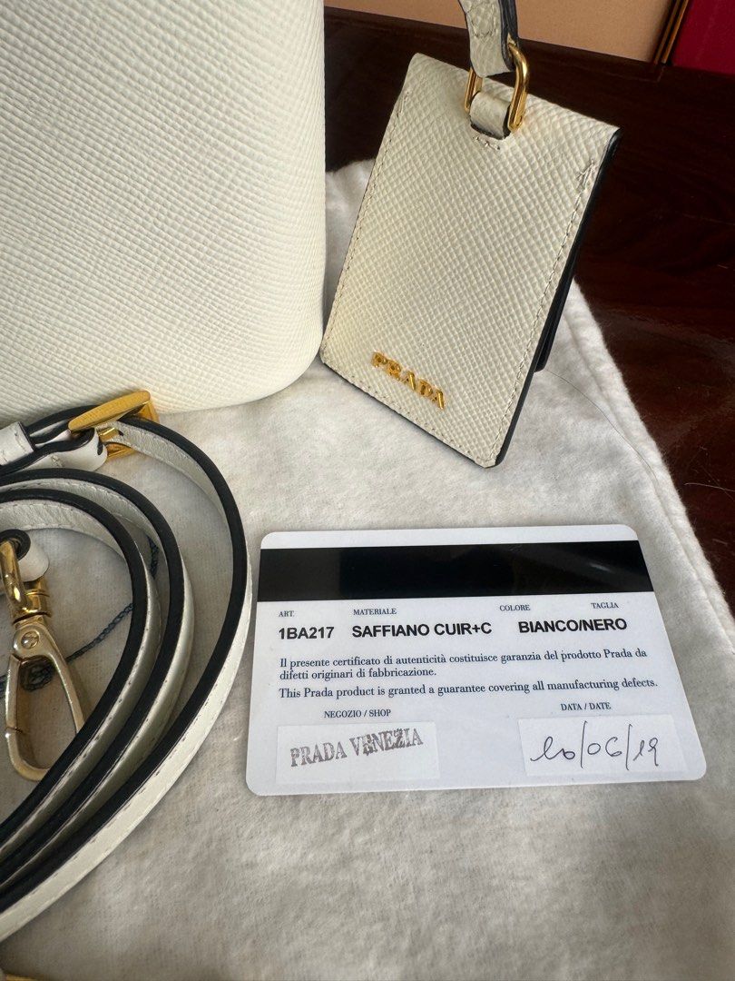 Authentic Prada (Category: Luxury Bags & Wallets) located in Manila. Submitted by chloe_luxuries (Listing ID 1332589508, Image 2). Description: Guaranteed original Prada saffiano Cuir small Panier bucket bag Still in excellent condition good as new Comes with complete inclusion Pm for those interested.