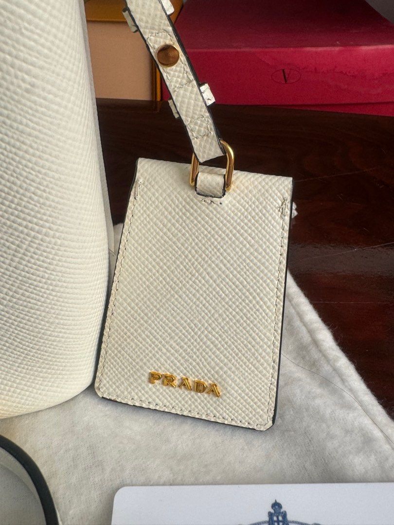 Authentic Prada (Category: Luxury Bags & Wallets) located in Manila. Submitted by chloe_luxuries (Listing ID 1332589508, Image 3). Description: Guaranteed original Prada saffiano Cuir small Panier bucket bag Still in excellent condition good as new Comes with complete inclusion Pm for those interested.