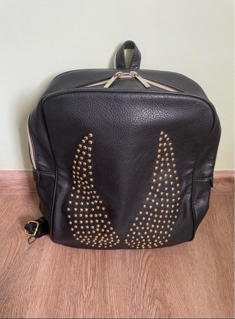 Black backpack (Category: Backpacks) located in Singapore. Submitted by amberley007 (Listing ID 1332544721, Image 1). Description: Black backpack Height 36cm x width 35cm Bought from Korea.