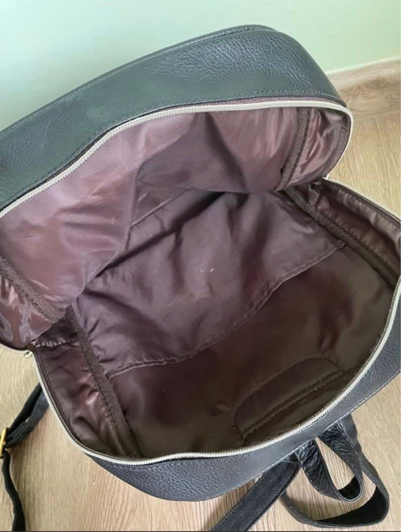 Black backpack (Category: Backpacks) located in Singapore. Submitted by amberley007 (Listing ID 1332544721, Image 2). Description: Black backpack Height 36cm x width 35cm Bought from Korea.
