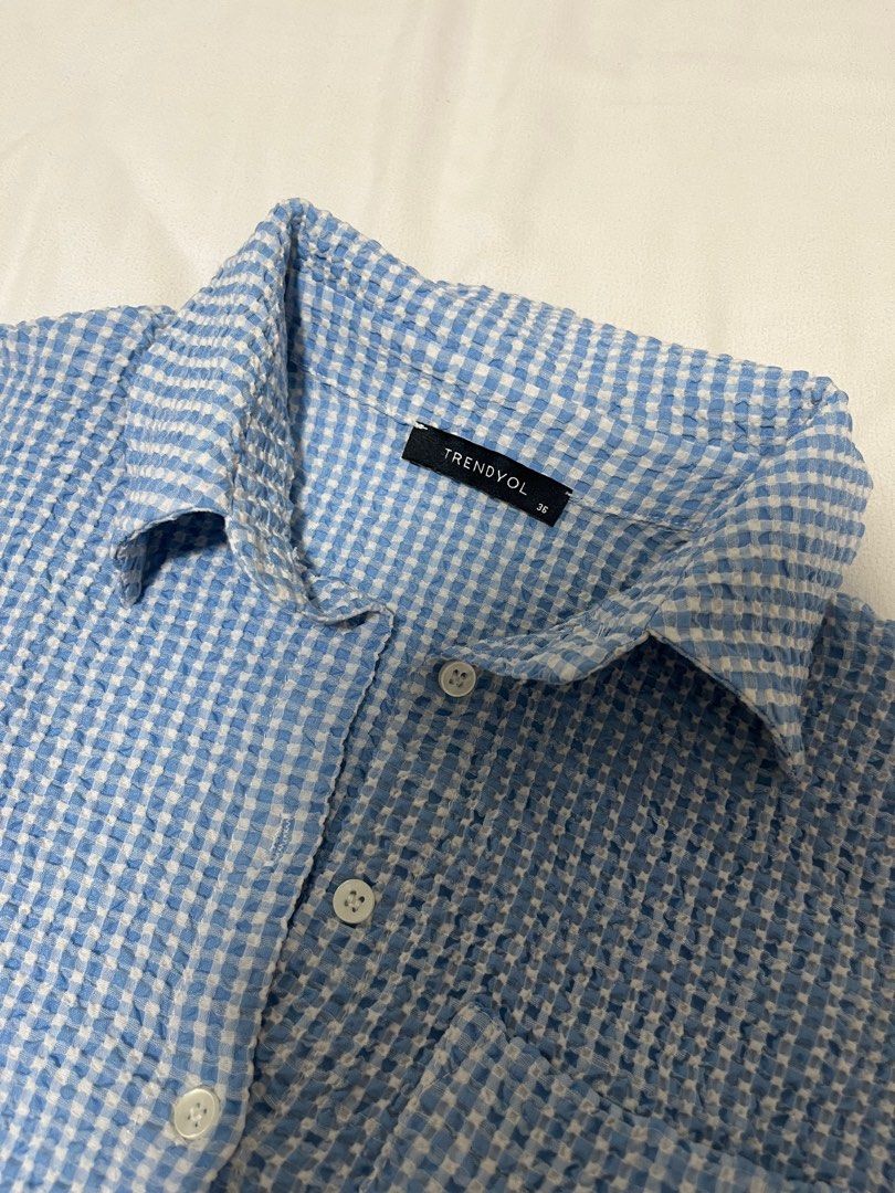 Blue Plaid Sleeveless Shirt (Category: Shirts) located in Quezon City. Submitted by d3clutters (Listing ID 1332474959, Image 3). Description: — bought from zalora; priced at 370 — worn a few times only — mop: gcash/bpi.