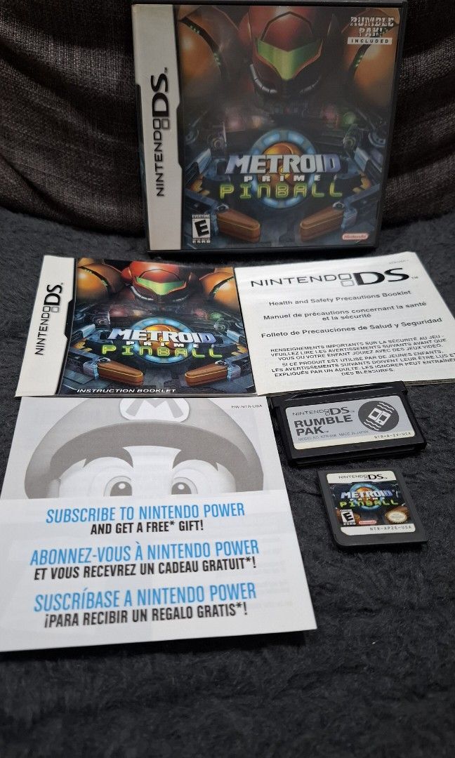 DS US Metroid Prime Pinball (Category: Nintendo) located in San Juan City. Submitted by ricsgaragesale (Listing ID 1332602601, Image 1). Description: Metroid Prime Pinball. Price: 4,500 PHP. - Authentic. - Tested and working. - US region. - CIB/Complete inserts. - With Rumble pack, the cartridge is working but the rumble sometimes is not working. I'll declare it as defective. - Near in good condition overall. - Clean contact pins. Note: All items