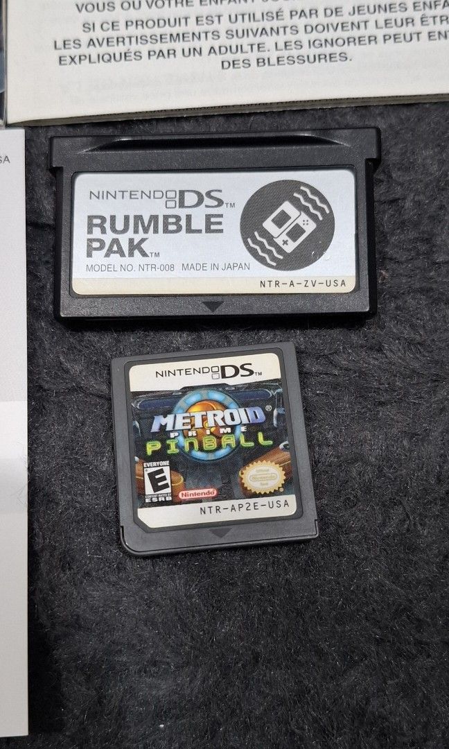 DS US Metroid Prime Pinball (Category: Nintendo) located in San Juan City. Submitted by ricsgaragesale (Listing ID 1332602601, Image 3). Description: Metroid Prime Pinball. Price: 4,500 PHP. - Authentic. - Tested and working. - US region. - CIB/Complete inserts. - With Rumble pack, the cartridge is working but the rumble sometimes is not working. I'll declare it as defective. - Near in good condition overall. - Clean contact pins. Note: All items