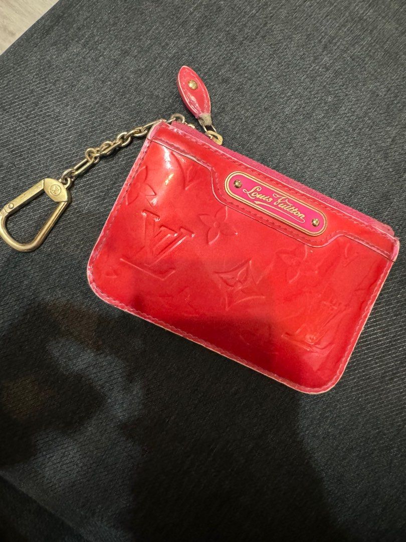 Louis Vuitton Red Coin Purse (Category: Luxury Bags & Wallets) located in Manila. Submitted by whitechocolatechip (Listing ID 1332555891, Image 2). Description: Still functional and cute. Can be used as a bag charm :) See pics for flaws. .