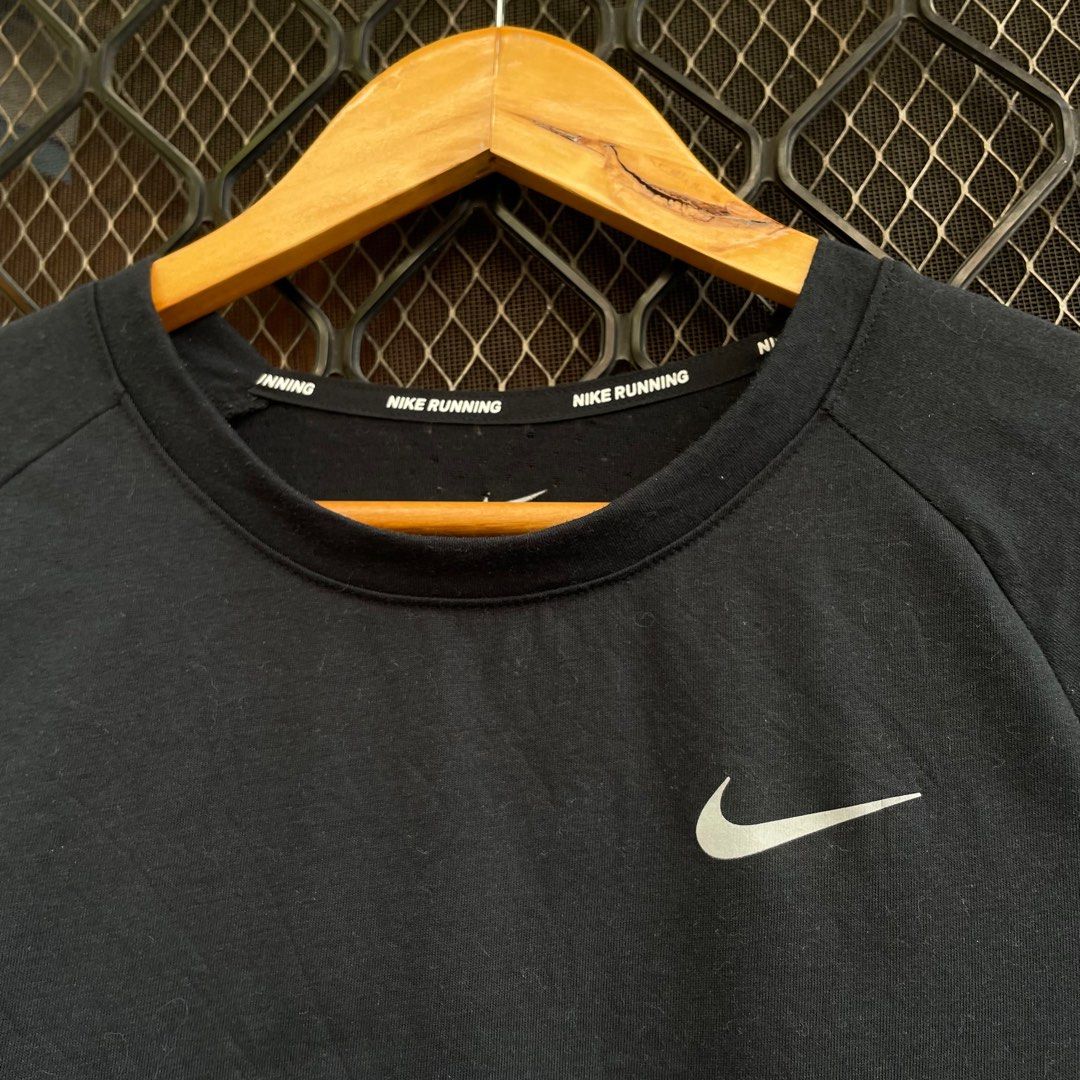Nike tailwind shirt womens top
