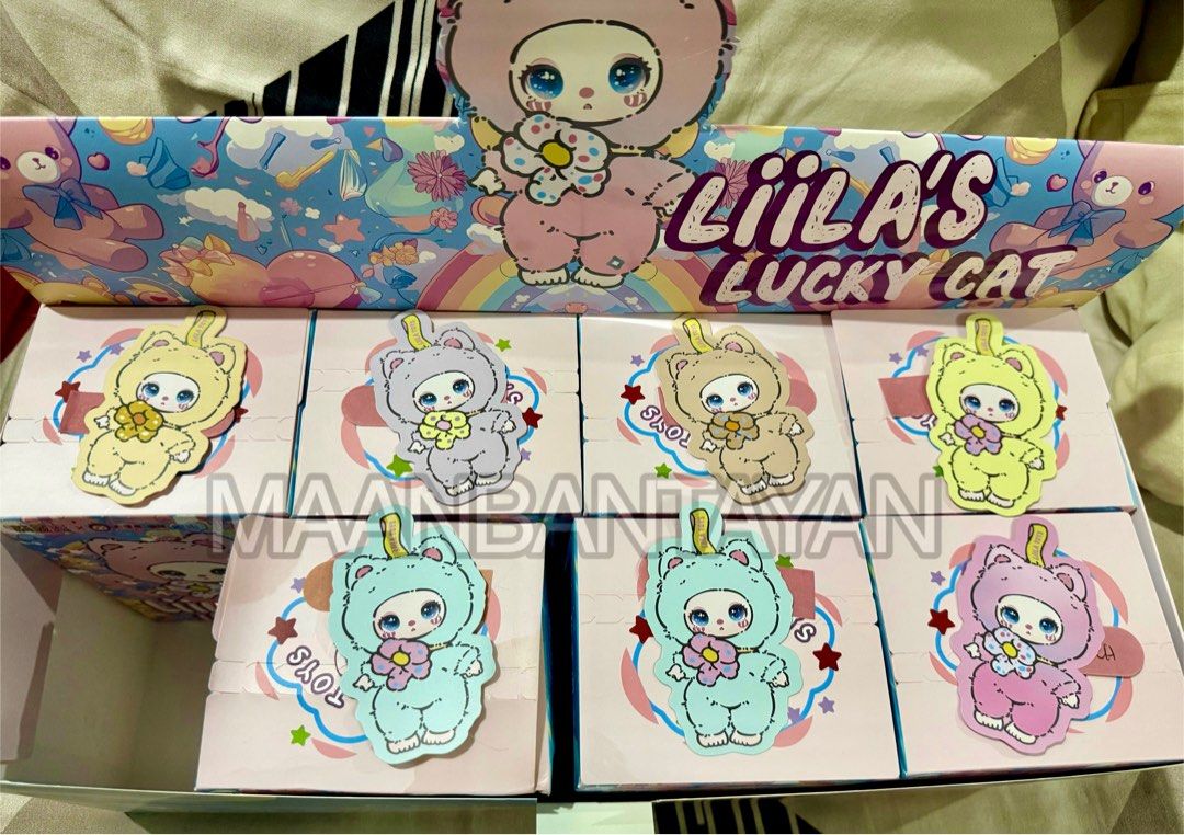 [ON-HAND] Liila 's Lucky Cat V1 (Category: Designer & Blind Box Toys) located in Mandaluyong City. Submitted by _maangirl (Listing ID 1331034560, Image 1). Description: Liila's Lucky Cat V1 💛 Sunshine Lemon (YELLOW) 1,000 (2pcs) 🍵 Seasalt Mint (MINT) 1,100 SOLD 🌸 Sakura Peach (PINK) 1,200 SOLD 🍓 Strawberry (FUSCHIA) 1,200 SOLD 💜 Main Theme Lilac (PURPLE) 1,000 SOLD 🍌 Creamy Banana (CREAM) 1,100 🩶 Milk Way Mist (GRAY) 1,200 SOLD ☕️ Latte (B
