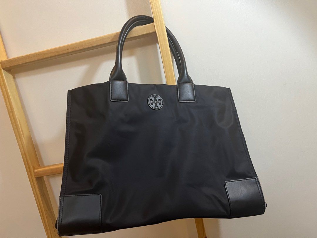 Tory Burch Tote Bag Nylon (Category: Luxury Bags & Wallets) located in Las Pinas. Submitted by zekeshopmn81651 (Listing ID 1332486371, Image 3). Description: Selling Tory Burch Large Bag. Used for traveling and day-to-day for carrying a lot of stuff. Bag is spacious. Usual wear and tear indicated on the photo.