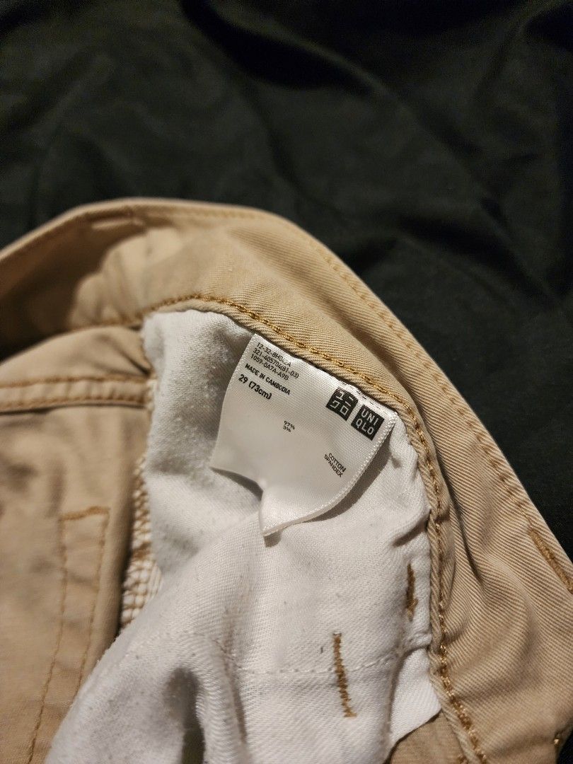 Uniqlo Khaki Chinos (Category: Chinos) located in Makati City. Submitted by ejsgmd (Listing ID 1332554608, Image 3). Description: Good condition Minimal stain (see photo).