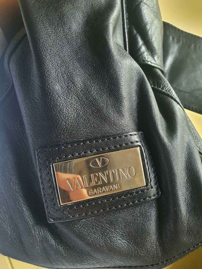 Valentino Bow Shoulder/Tote bag (Category: Luxury Bags & Wallets) located in Davao. Submitted by moodsale (Listing ID 1332501289, Image 2). Description: Valentino Bow Bag Size : Large top zip closure (valentino zipper) corners all good message me to send mo pictures sf c/o buyer.