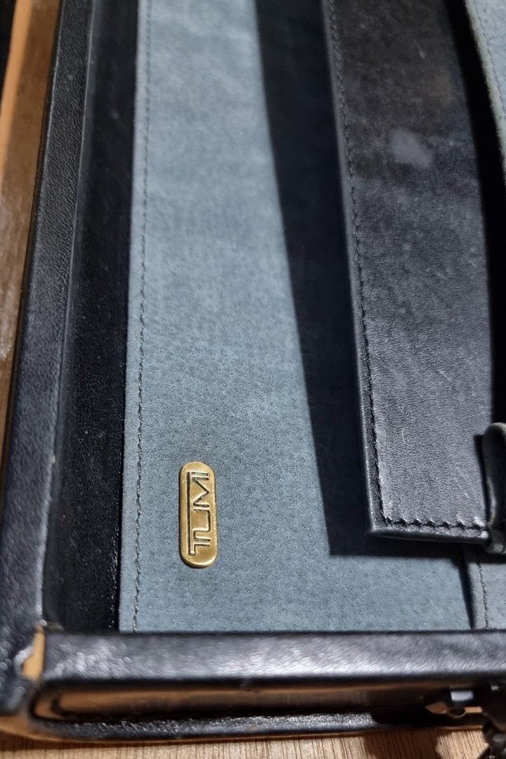 Vintage Tumi Attache Case Black Leather (Category: Briefcases) located in Mandaluyong City. Submitted by kinergy04 (Listing ID 1332540929, Image 2). Description: Selling vintage TUMI black leather attache case. Item is well used with sings of usage but very presentable. Slight negotiable..