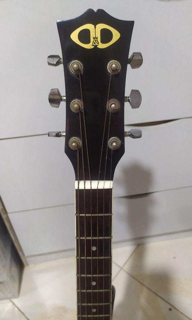 D&D Slim Standard Acoustic Guitar (Category: Musical Instruments) located in Malolos. Submitted by noshfild (Listing ID 1332722896, Image 2). Description: D&D Slim Standard Acoustic Guitar Black with built-in tuner with free capo with free stand with standard guitar bag high action - selling as is for pick up only at Malolos, Bulacan fixed price.