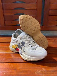Gucci fly sneakers hot sale