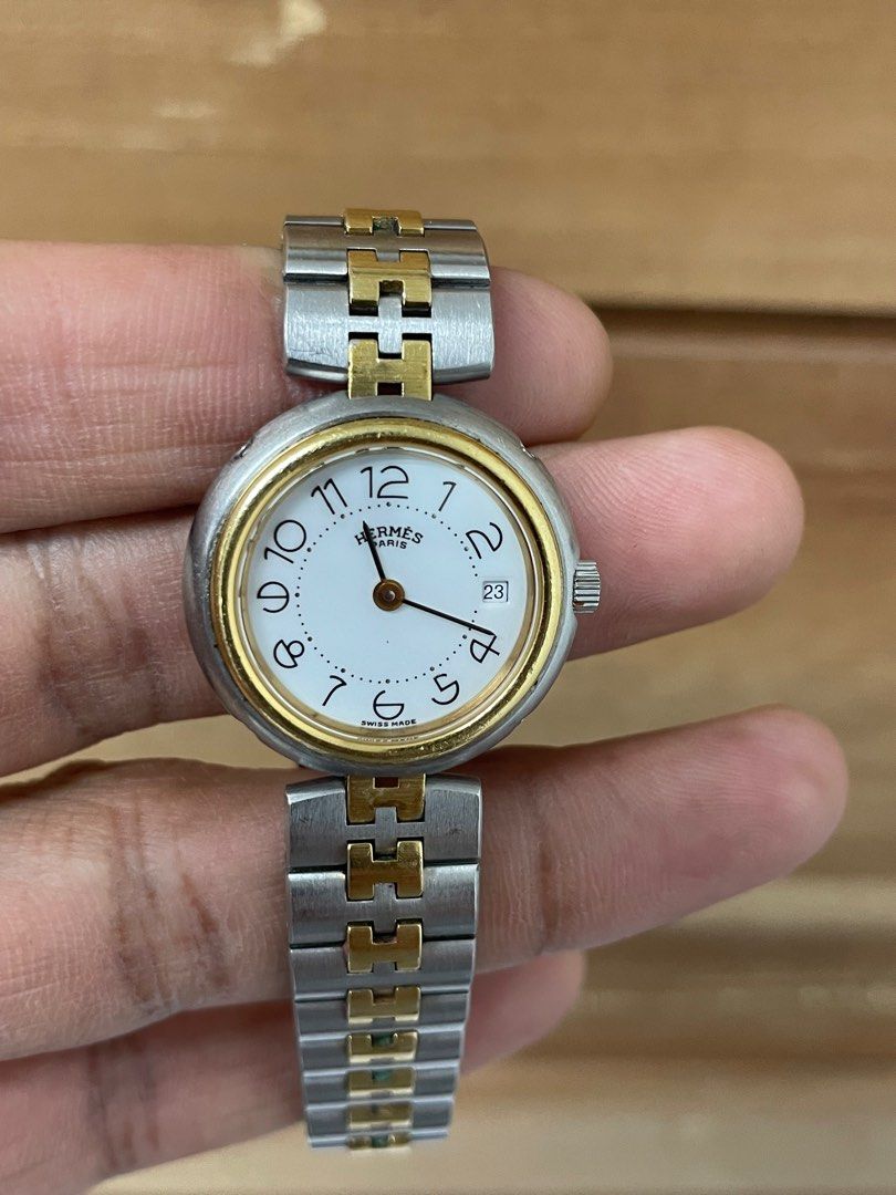 HERMES Profile Two-tone Ladies' Watch (Category: Luxury Watches) located in Manila. Submitted by luxemax_09 (Listing ID 1332730115, Image 3). Description: Gender: Ladies’ Reference #: 436365 Movement: Quartz Case Size: 25mm / 26mm (with crown) Case Material: Stainless steel Strap Size: 6.5” / 7.5” (with face) Crystal: Sapphire Water Resistance: 30m Dial Type/Color: Analog / White Calendar: Date display Band Type: Bracelet Band Material: Stainless