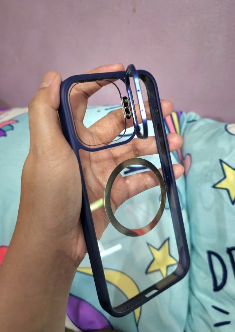iPhone 15 Pro Max Case Navy Blue with stand Acrylic back with Magsafe (Category: Cases & Sleeves) located in Mandaluyong City. Submitted by ssshashimi (Listing ID 1332745394, Image 3). Description: iPhone 15 Pro Max Case Navy Blue with stand Acrylic back with Magsafe ✔️ Pre-loved ✔️ With hairline scratches and signs of usage but not dirty ✔️ Nice grip What you see is what you get 😉 📍 Mandaluyong No COD. MOP: GCASH / BPI / SEABANK Buyer pays rid
