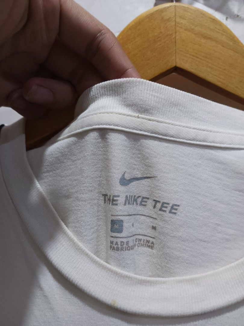 Nike nsw taped tee Fesyen Pria Pakaian Atasan di Carousell