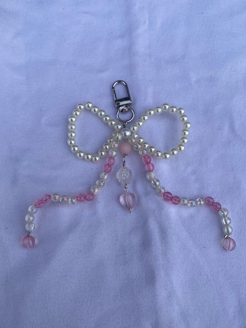 Ribbon bag keychain beads anik anik (Category: Charms) located in Rizal. Submitted by bbeli (Listing ID 1332705387, Image 3). Description: Bag keychain Anik anik Mod: same day delivey/ grab/lalamove Mop: Gcash/meet up.
