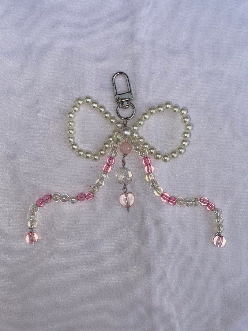Ribbon bag keychain beads anik anik (Category: Charms) located in Rizal. Submitted by bbeli (Listing ID 1332705387, Image 2). Description: Bag keychain Anik anik Mod: same day delivey/ grab/lalamove Mop: Gcash/meet up.