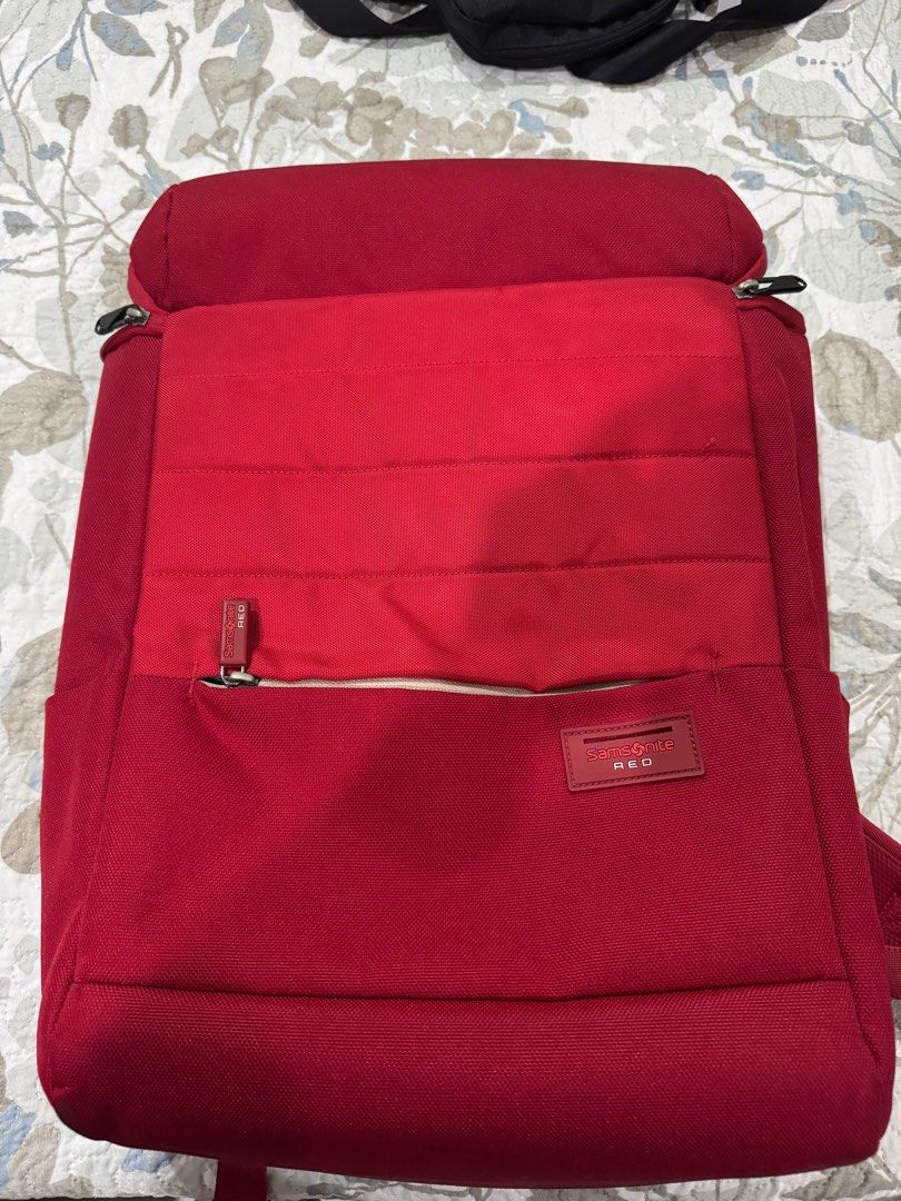 Samsonite Red Backpack (Category: Backpacks) located in Paranaque City. Submitted by gelato09 (Listing ID 1332710877, Image 1). Description: Samsonite Red top-open backpack Top zippers replaced Original zippers inside and on the small pocket outside Condition: 7/10 has some dirt Location: BF Homes Parañaque For pick up or shipping (shouldered by buyer) Payment through GCash/Seabank/BPI.