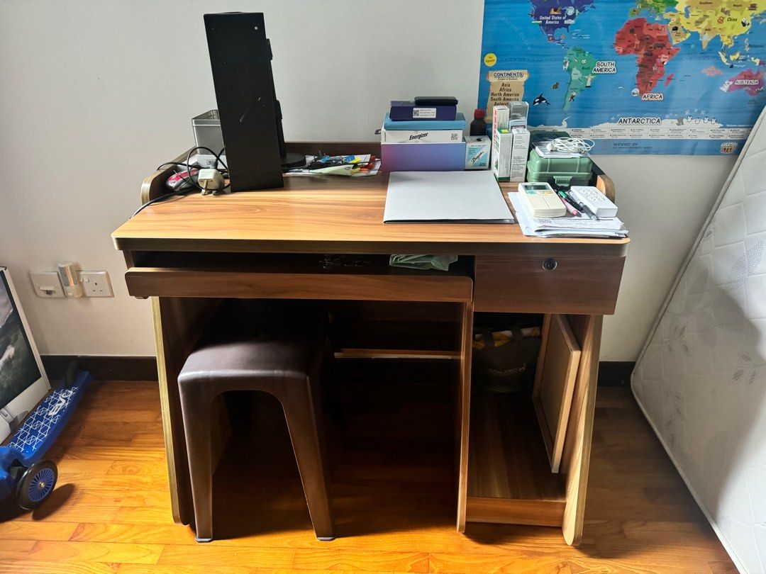 Solid wood study table (Category: Tables & Sets) located in Singapore. Submitted by ariesmoo (Listing ID 1332684521, Image 1). Description: Got a longer table for my boys that can fit 2 chairs. So giving this away for free..