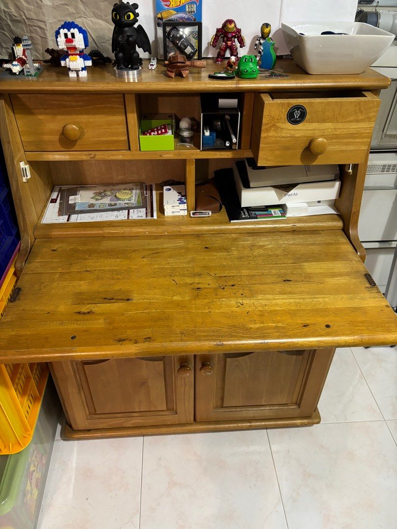 Solid Wood Study Table (Category: Tables & Sets) located in Singapore. Submitted by leeksandcelery (Listing ID 1332749728, Image 3). Description: Study table with multiple compartments with pull-down table and storage Quite heavy but durable Dimensions: Height 112cm Length 85cm Full width 39cm Extended width (With pulled down table) 63cm Delivery not included(To arrange own transportation).