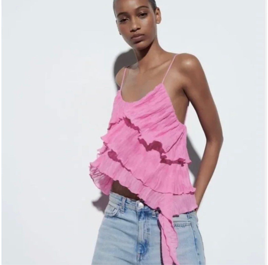 Zara Pink Ruffle Sleeveless Top (Category: Blouses) located in Manila. Submitted by isxbela (Listing ID 1332670900, Image 2). Description: Like new, only worn twice, no flaws Bust is up to 34”, length is 22” Super nice top! No when worn pics aside from the ones already posted, taken from the Zara website 📍Sta Cruz Manila.