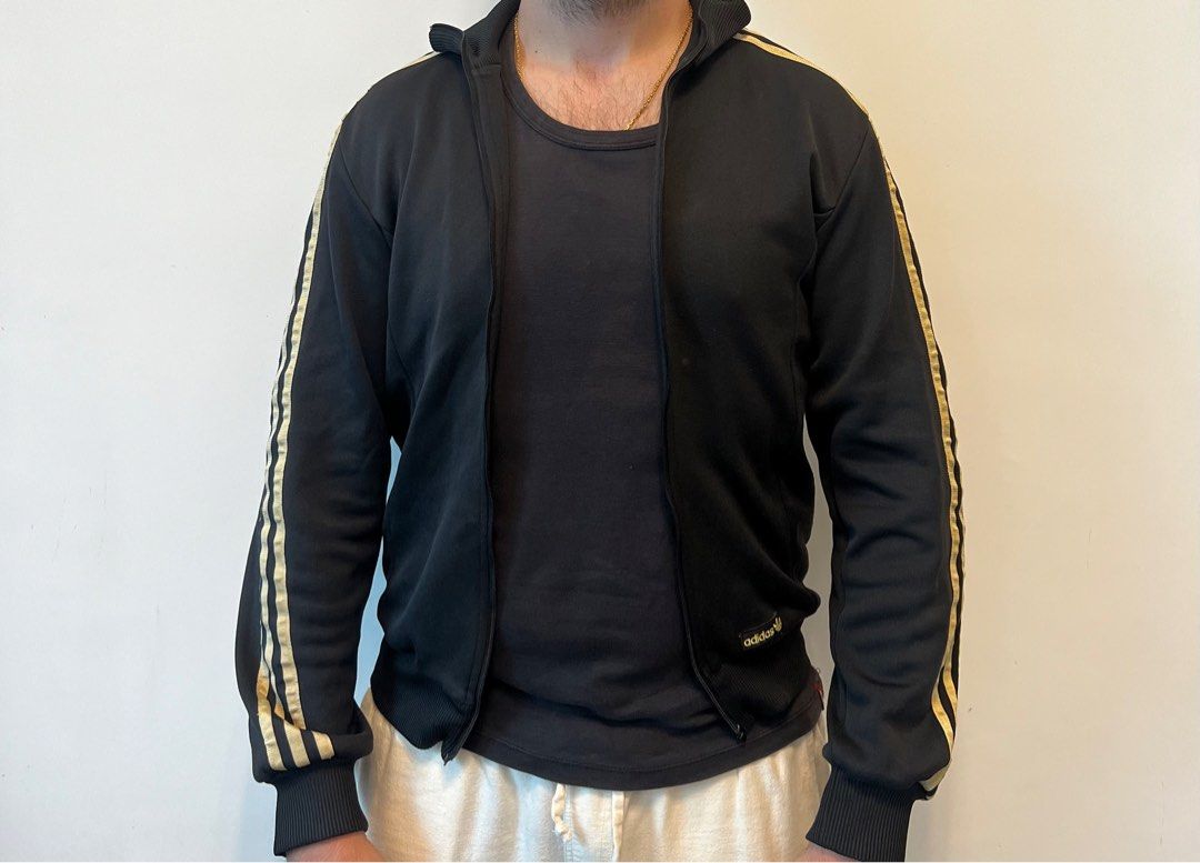 Adidas originals black and gold jacket sales