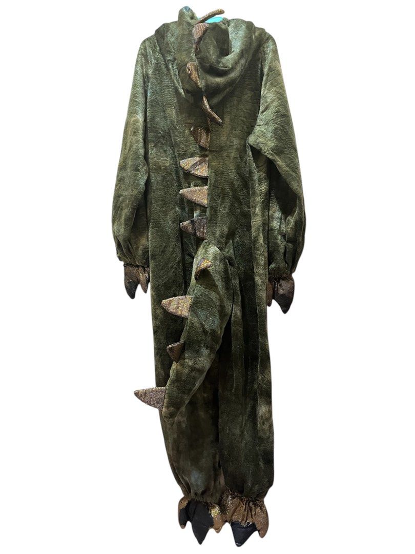 Dinosaur Costume (Category: Babies & Kids Fashion) located in San Fernando. Submitted by InvisibleMe (Listing ID 1332822061, Image 2). Description: Faded on gold parts Have small hoes Please see photos for flaws 5-7 .