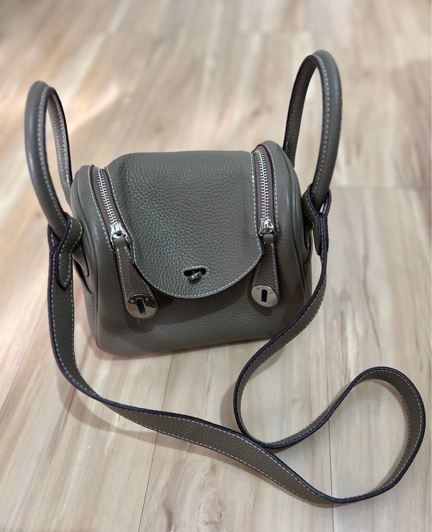 Leather Shoulder Cross Body Bag (Category: Purses & Pouches) located in Paranaque City. Submitted by msurfer (Listing ID 1332936675, Image 2). Description: Lindy design - Cowhide Genuine Leather bag Silver Hardware No brand, Lindy design Size : 20cm x 12cm x 16cm Texture : Cowhide Color : Grey Good condition It has few scuffs but due to storage .
