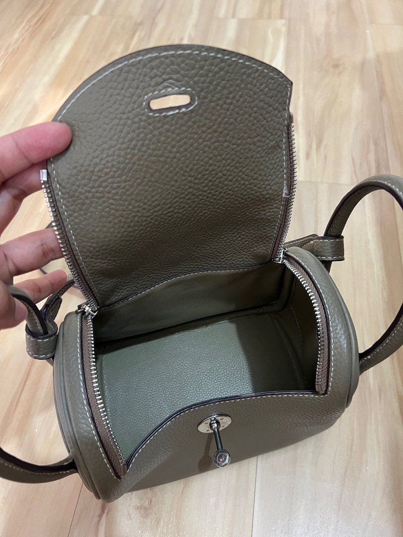 Leather Shoulder Cross Body Bag (Category: Purses & Pouches) located in Paranaque City. Submitted by msurfer (Listing ID 1332936675, Image 3). Description: Lindy design - Cowhide Genuine Leather bag Silver Hardware No brand, Lindy design Size : 20cm x 12cm x 16cm Texture : Cowhide Color : Grey Good condition It has few scuffs but due to storage .