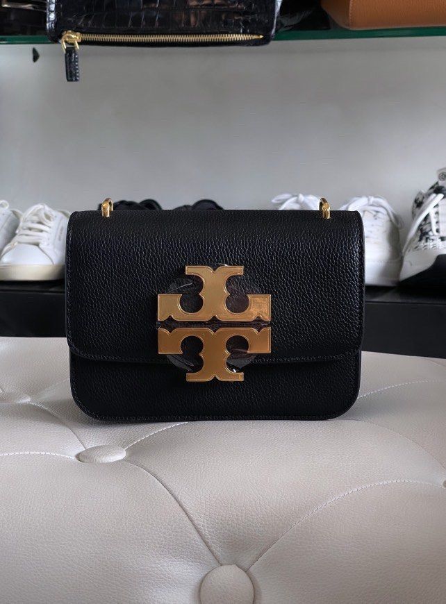 Tory Burch Eleanor Small Pebbled Bag (Category: Luxury Bags & Wallets) located in Quezon City. Submitted by maekuuh (Listing ID 1332949435, Image 3). Description: Authentic Used once October 2024 Measurement: Height: 5.3” (13.5cm); length: 7.5” (19cm); depth: 2.6” (6.5cm) Adjustable leather crossbody strap with 21.3” (54cm) drop Fabric/Materials: Main Body : 100% Calf Leather Trim : 100% Cow Leather Lining : 100% Polyurethane (PU) Pebbled leather
