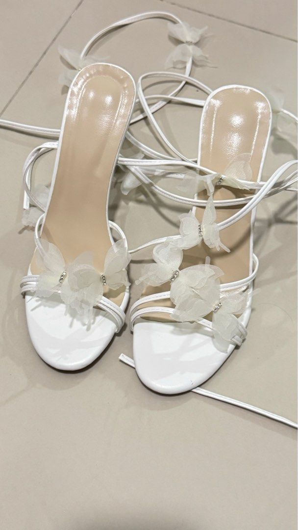 White butterfly fairy heels (Category: Heels) located in Pasay City. Submitted by closetbysd (Listing ID 1332916918, Image 3). Description: RFS ordered a small size will get a bigger one.