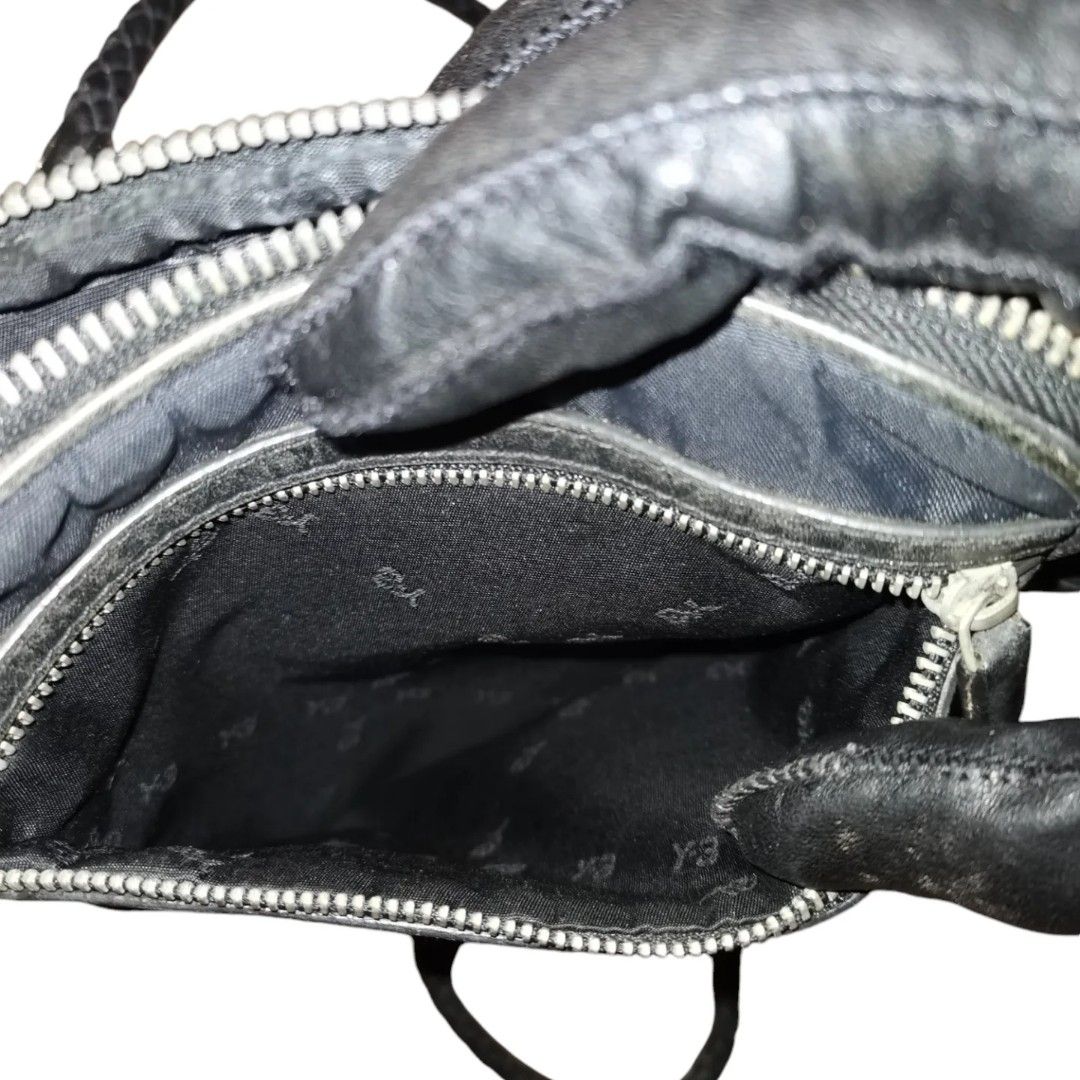 Y3 yohji yamamoto sling bag (Category: Sling Bags) located in Manila. Submitted by eagerbeaverph (Listing ID 1332917335, Image 3). Description: For sale Y3 yohji yamamoto sling bag Height 9 inches Length 6.5 Width .5 fits your daily essentials wallet, cellphone, passport etc Lightweight good for daily use Minimal signs of usage leather zip pull please see detailed pics Negotiable Dm 📩.