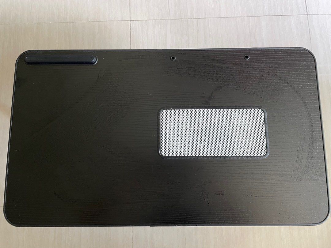 Adjustable mini table (Category: Tables & Sets) located in Singapore. Submitted by bevvvvvlyyy (Listing ID 1333033767, Image 2). Description: Bought it a few months ago. Lightly used. Adjustable mini table - can be put on bed or on a bigger table. Dimensions: 60cm x 34cm Height: 24 cm, can be adjusted to 32cm Table can be folded as shown. USB port that comes along with it. .