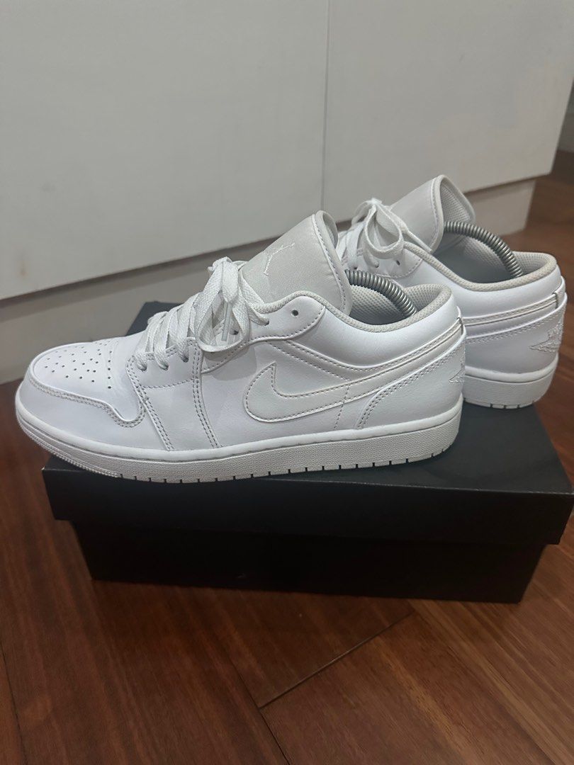 Air Jordan 1 Low “Triple White” (Category: Sneakers) located in Taguig. Submitted by clsaint (Listing ID 1333037640, Image 3). Description: Bought in Atmos Japan. Comes with original box. Size US 9. Rarely used, almost new.